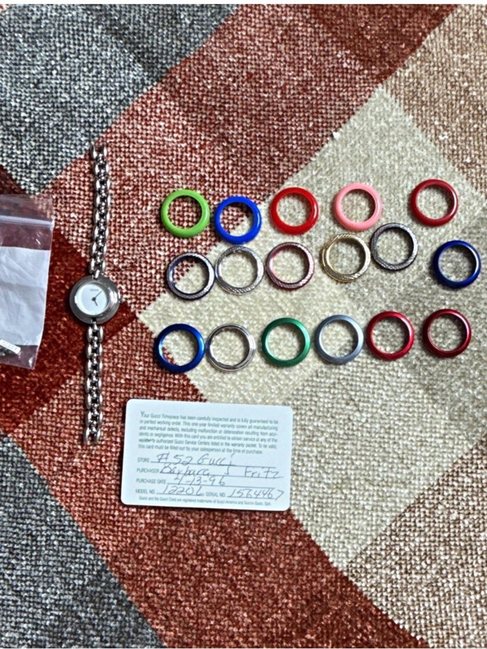 Gucci Women's Silver Bracelet Watch with Multicolor Interchangeable Bezels